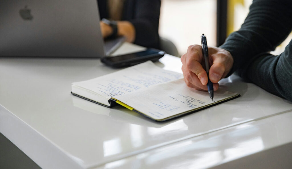 A close-up of a wooden legal gavel resting on a desk, representing professional litigation and court proceedings.