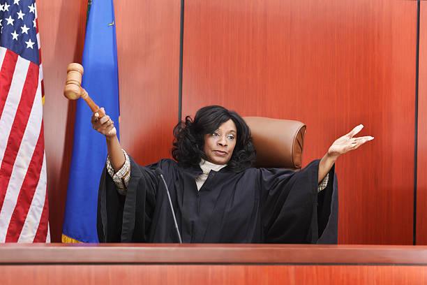 An African American female judge in the courtroom.