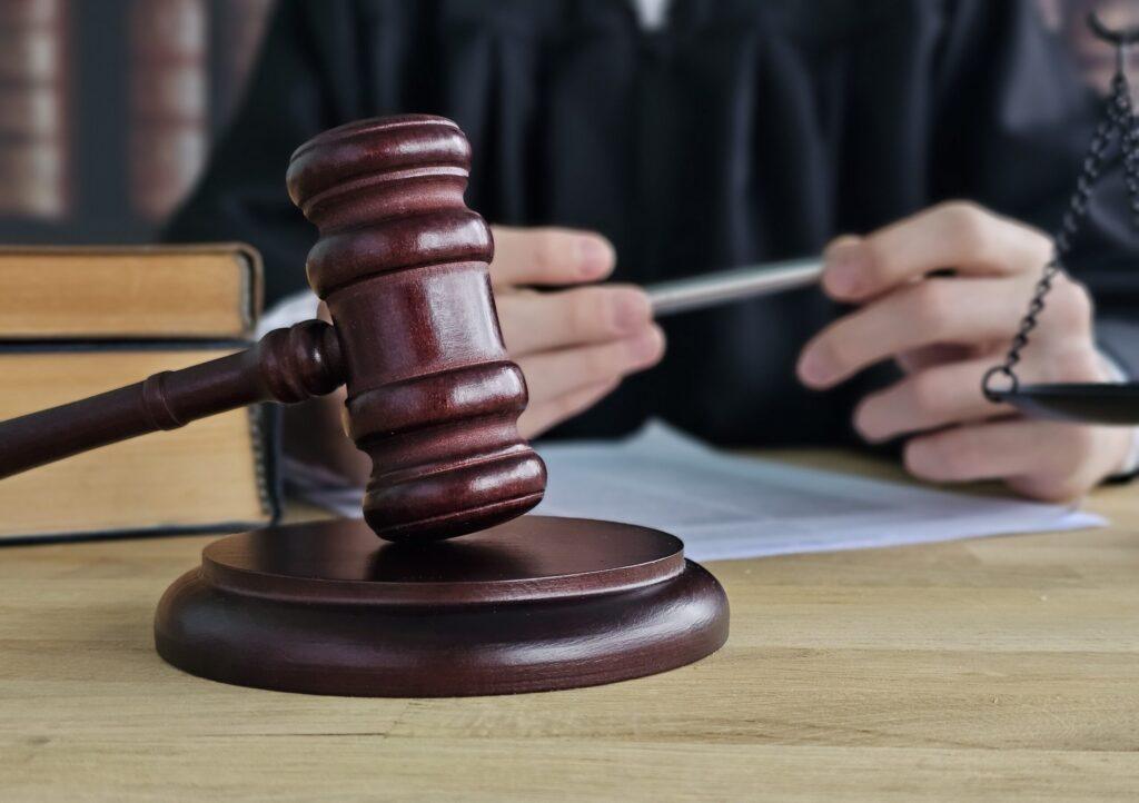 Judge,Uses,Gavel,During,Court,Session,As,Legal,Documents,And