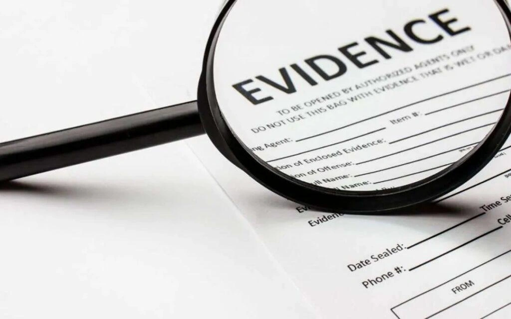 Magnifying glass over a legal evidence document, representing investigation, forensic analysis, and courtroom evidence in a legal case.